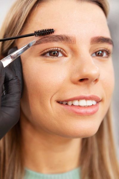 beautiful-young-woman-going-through-microblading-treatment-(1)