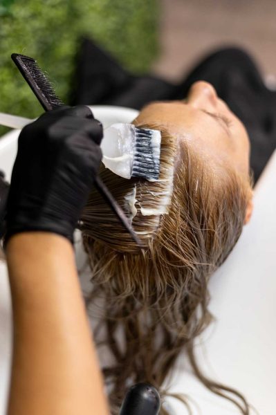 woman-getting-her-hair-washed-beauty-salon